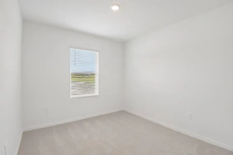 Representative unfurnished interior of a home built from the Blackbird by Taylor Morrison in Azure at Solaeris, Port St. Lucie (Image 9).