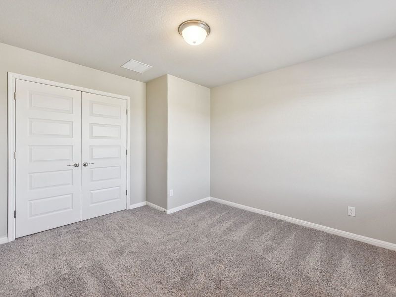 Spacious, unfurnished interior of a new home in Big Sky Ranch - Executive Collection, Dripping Springs (Image 17).