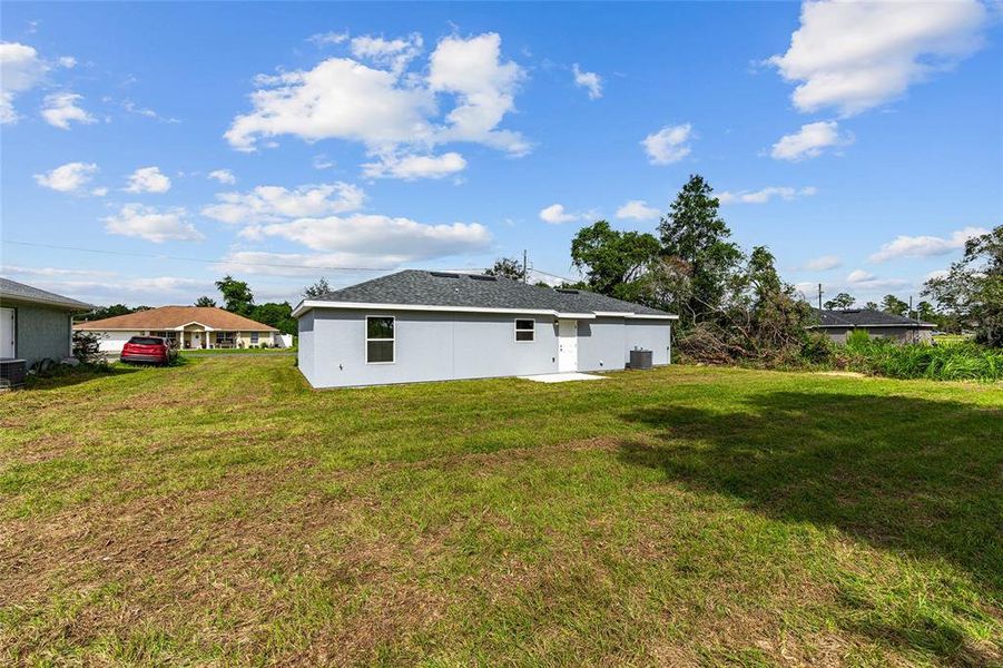 Front exterior of a new home in , Ocala, FL, highlighting curb appeal (Image 15).