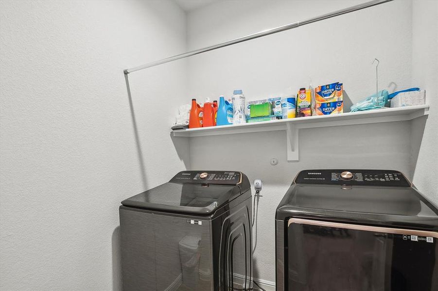 Washroom featuring washing machine and dryer Washroom featuring washing machine and dryer