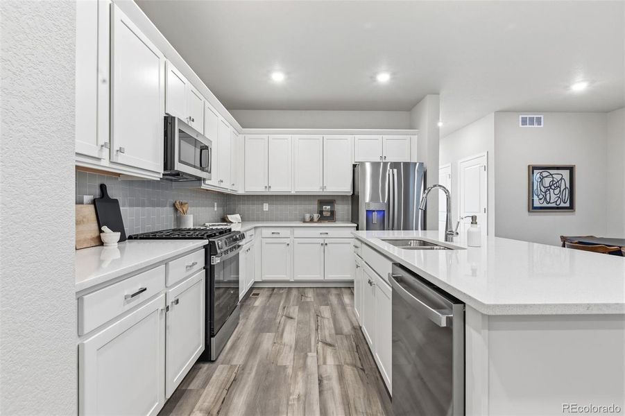 Furnished interior view inside a new home in Woodrose at Painted Prairie, Aurora (Image 7).