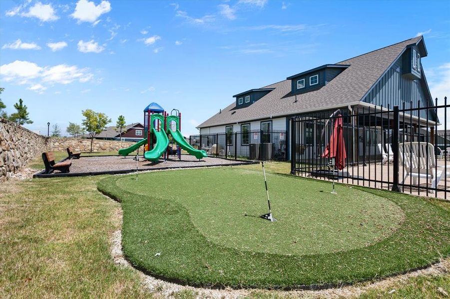 Community playground with a putting green