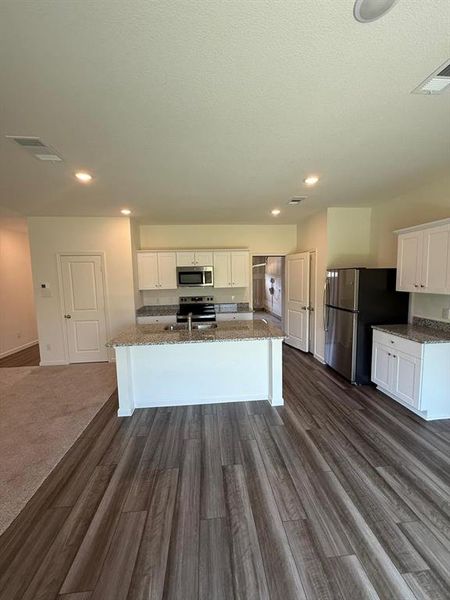 Furnished interior view inside a new home in Meadow Park, Melissa (Image 3).