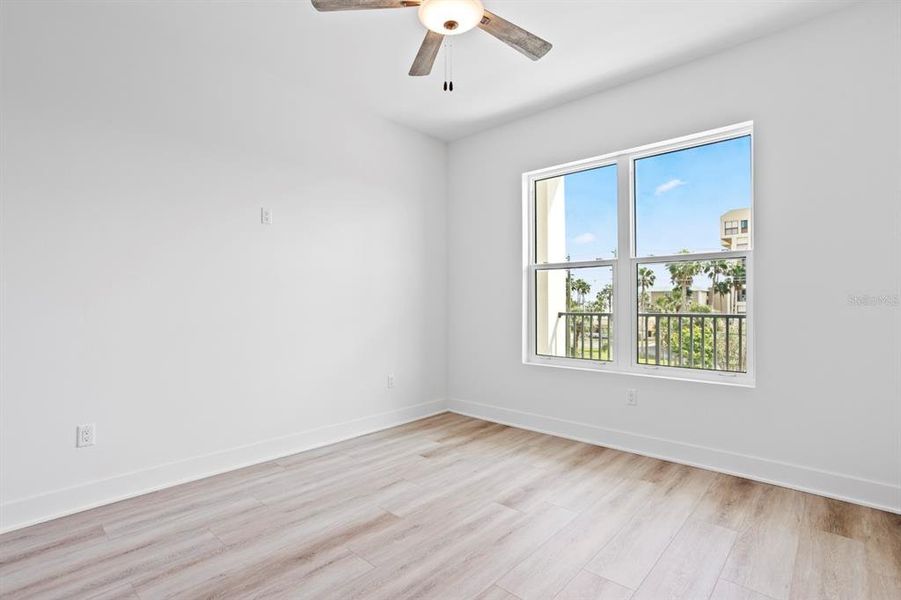 Spacious, unfurnished interior of a new home in Residences at Town Center, Madeira Beach (Image 40).