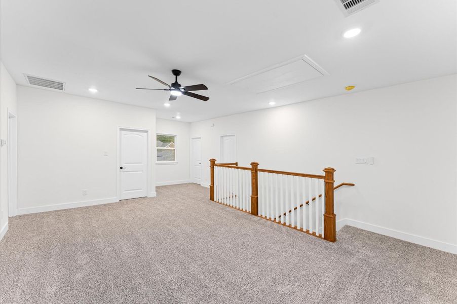 Expansive upstairs game room offering plenty of space for a media setup, kids’ play area, or a home office — designed for versatility and comfort. Expansive upstairs game room offering plenty of space for a media setup, kids’ play area, or a home office — designed for versatility and comfort.