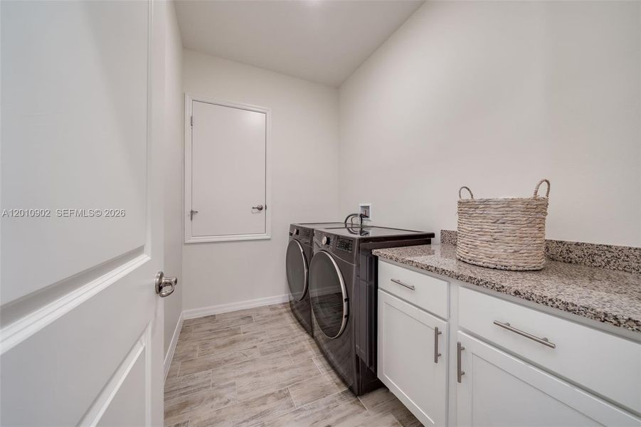 Furnished interior view inside a new home in , Port St. Lucie (Image 9).