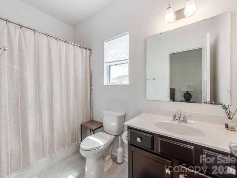 Furnished interior view inside a new home in Sutter's Mill II, Troutman (Image 32).