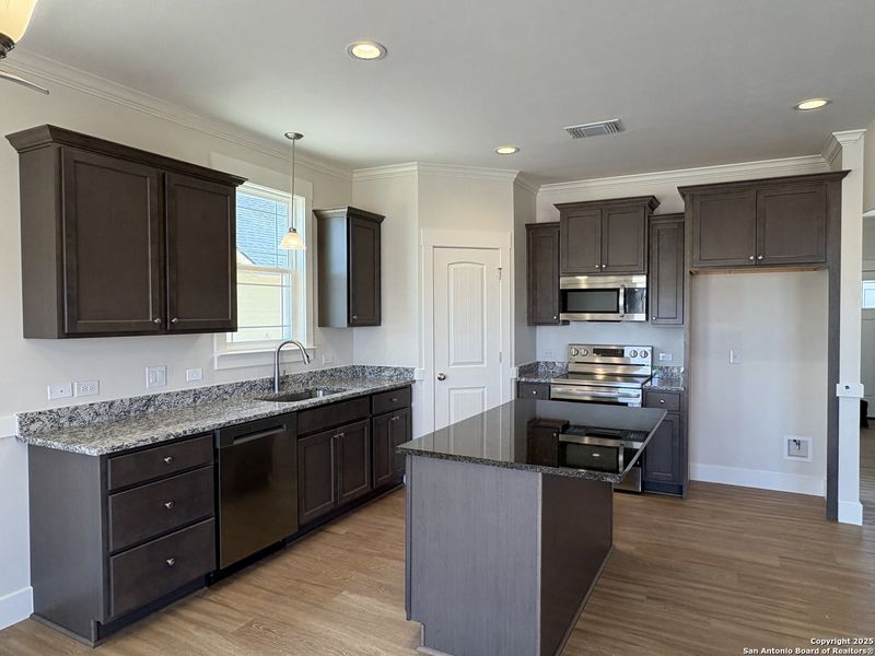 Furnished interior view inside a new home in Las Palomas Country Club Estates, La Vernia (Image 3).