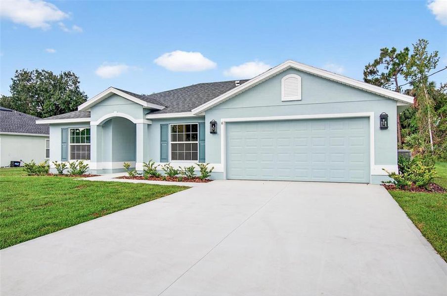 Front exterior of a new home in , Palm Coast, FL, highlighting curb appeal (Image 2).
