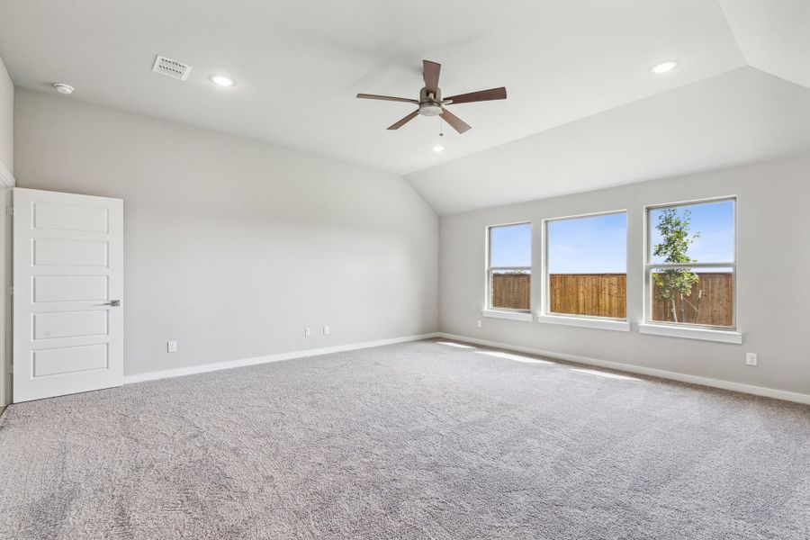 Primary Suite in the Bowie home plan by Trophy Signature Homes – REPRESENTATIVE PHOTO
