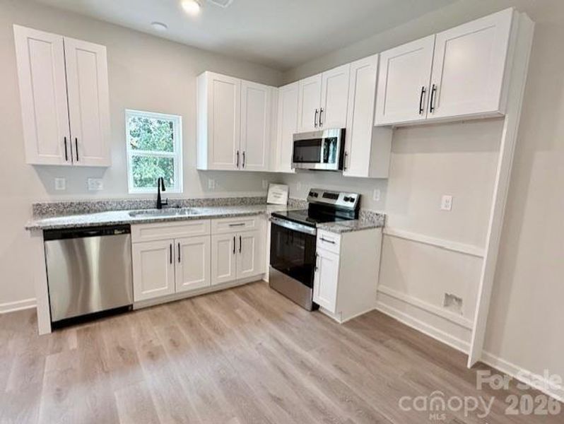 Furnished interior view inside a new home in , Bessemer City (Image 31).