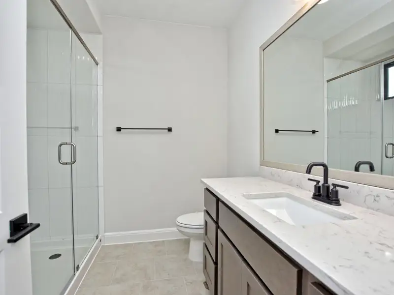 Representative furnished interior of a home built from the Santa Barbara II by Giddens Homes in Scofield Farms Estates, Georgetown (Image 82).