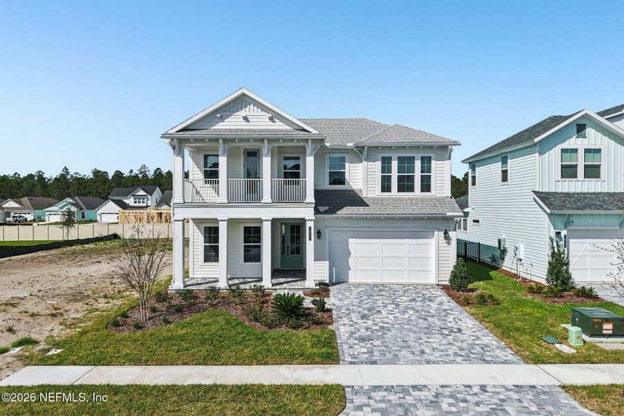 Front exterior of a new home in Nocatee, Ponte Vedra, FL, highlighting curb appeal (Image 35).