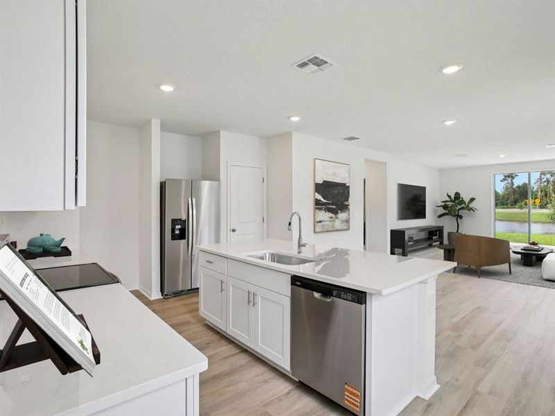 Furnished interior view inside a new home in The Grove at Stuart Crossing - Premier Series, Bartow (Image 5).