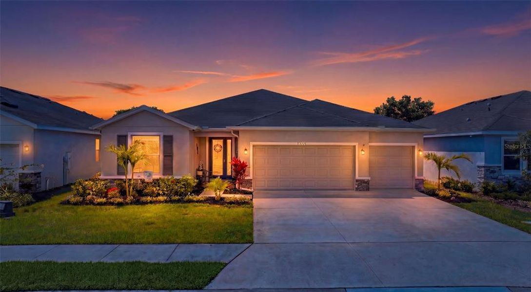 Front exterior of a new home in Solera at Lakewood Ranch, Bradenton, FL, highlighting curb appeal (Image 25).