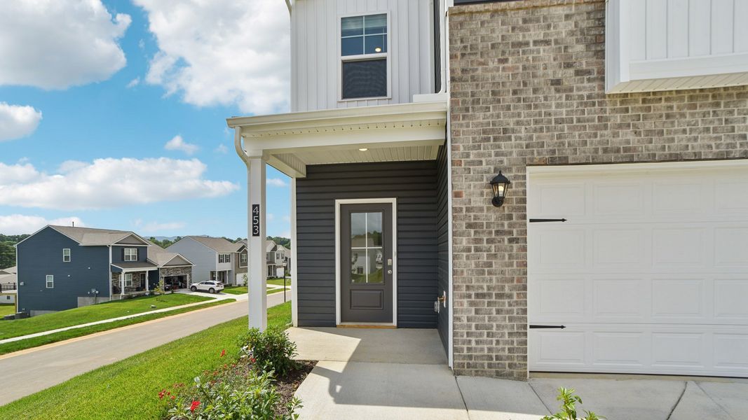 Representative exterior photo of a completed home built from the Craig by D.R. Horton in The Hideaway at Fox Meadows, Bluff City, TN (Image 19).
