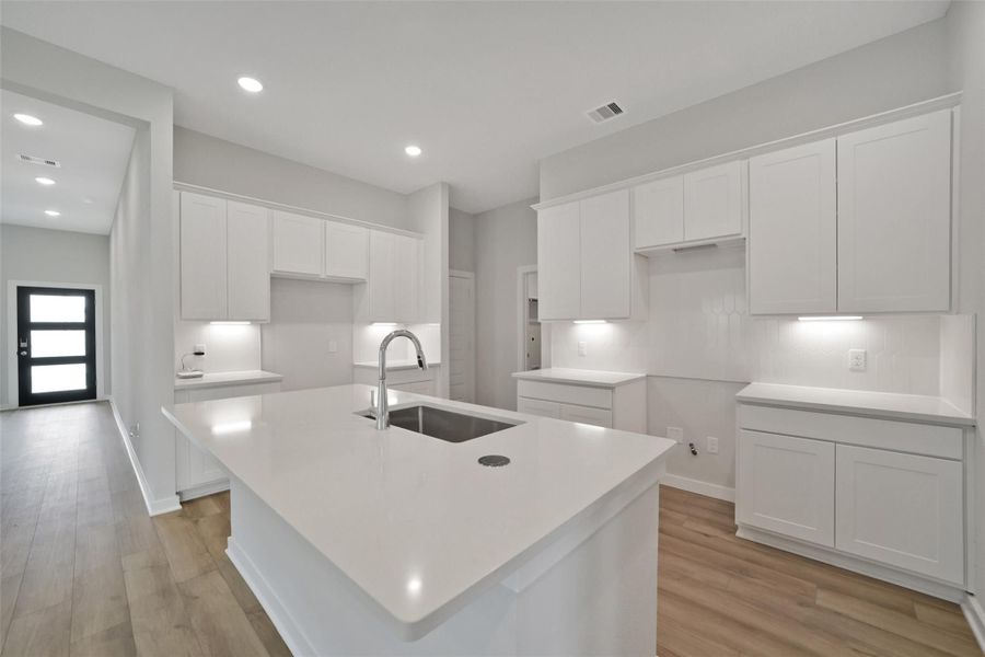 Furnished interior view inside a new home in Sunterra, Katy (Image 114). Furnished interior view inside a new home in Sunterra, Katy (Image 114).