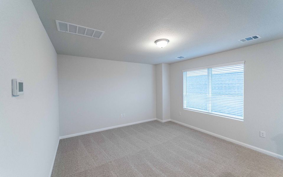 Spacious, unfurnished interior of a new home in Brooklands, Hutto (Image 15).