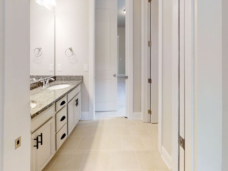 Representative furnished interior of a home built from the The Riposo by Avencia Homes in Riverwalk, Rock Hill (Image 6).