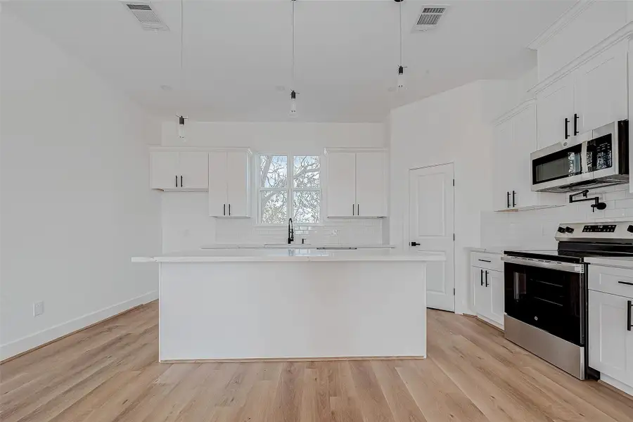 Furnished interior view inside a new home in , Houston (Image 10).
