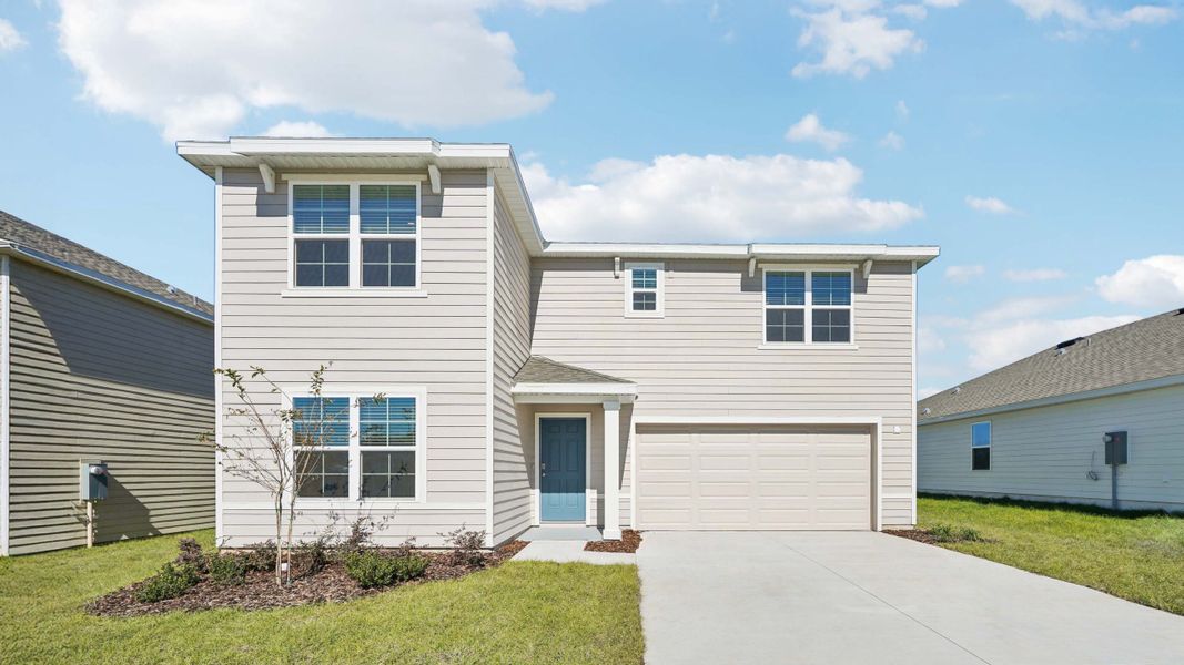 Representative exterior photo of a completed home built from the Ensley by D.R. Horton in Briarwood, Alachua, FL (Image 1).
