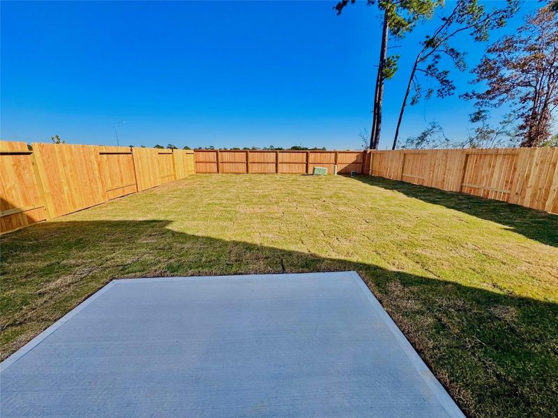 Exterior details and patio area of a home in Spring Creek Trails, Magnolia (Image 2). Exterior details and patio area of a home in Spring Creek Trails, Magnolia (Image 2).