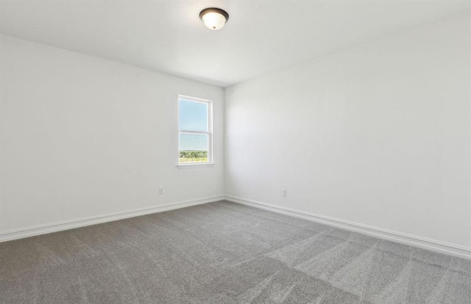 Secondary bedroom designed for comfort and convenience *Real home pictured