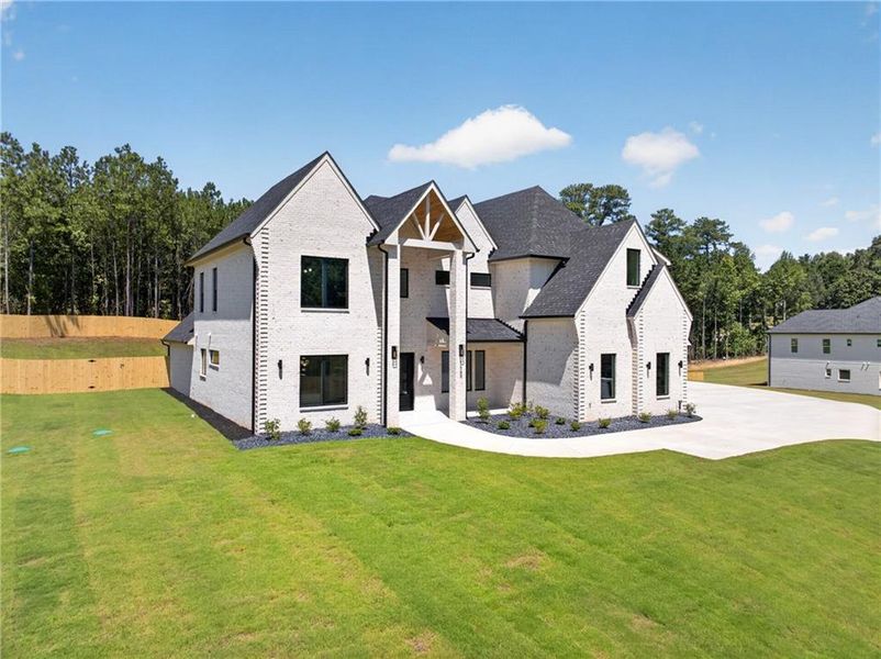 Front exterior of a new home in , Dacula, GA, highlighting curb appeal (Image 28).