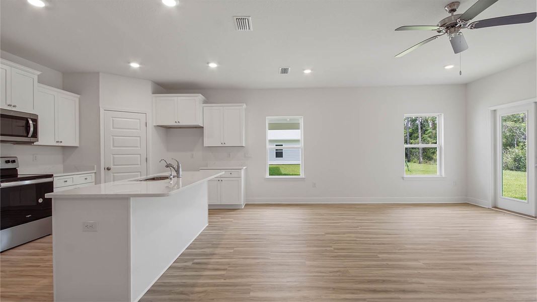 Representative furnished interior of a home built from the Kennedy by D.R. Horton in Bayside at Ward Creek, Panama City Beach (Image 9).