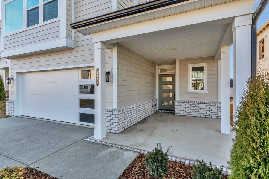 Exterior details and patio area of a home in Nexus – Park Collection, Gallatin (Image 4).