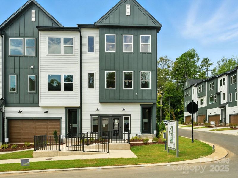 Front Exteriors with Front Load Garage and Full Length Driveways. *Model Photos | Actual Finishes, Structural Selection, and Orientation May Vary.