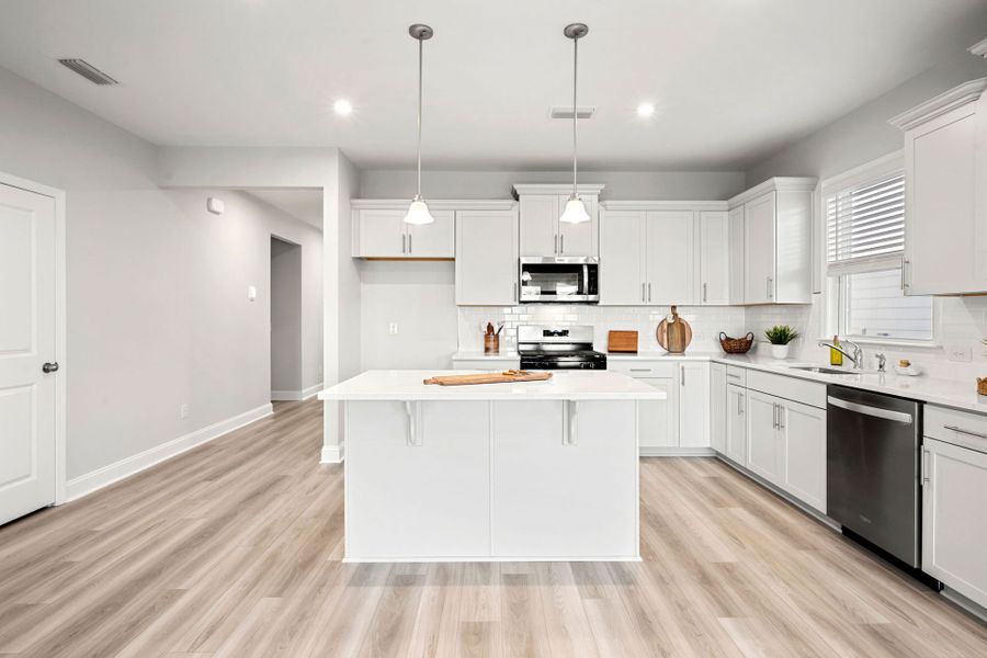 Furnished interior view inside a new home in Salem Bay, Beaufort (Image 6).
