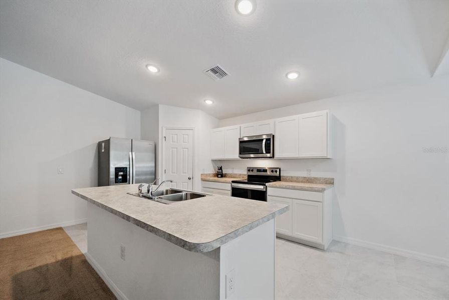 Furnished interior view inside a new home in , Port Charlotte (Image 6).