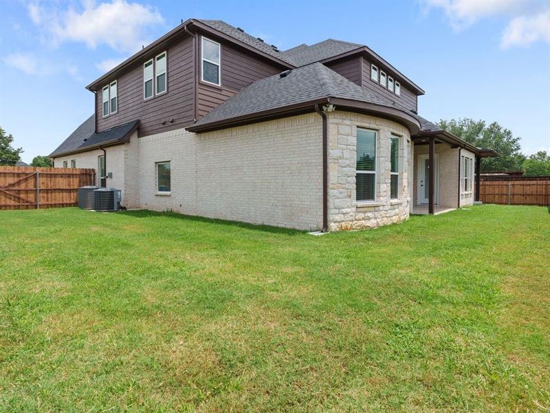 Exterior details and patio area of a home in , Denison (Image 22). Exterior details and patio area of a home in , Denison (Image 22).