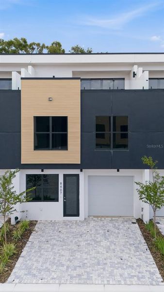 Front exterior of a new home in , Tampa, FL, highlighting curb appeal (Image 1). Front exterior of a new home in , Tampa, FL, highlighting curb appeal (Image 1).