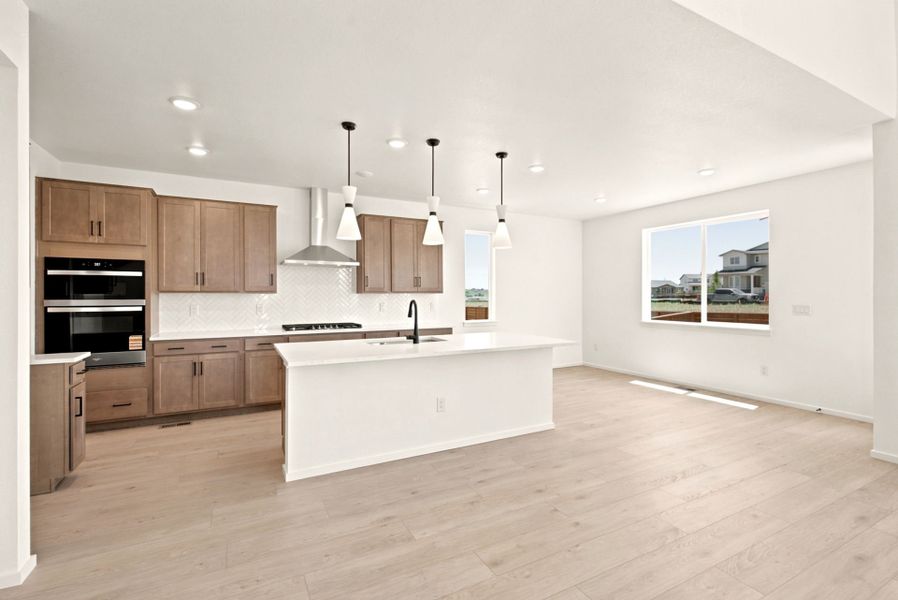 Furnished interior view inside a new home in Cordovan, Firestone (Image 4).