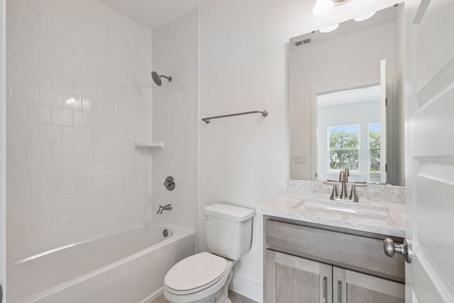 Furnished interior view inside a new home in Northlake at Ovation, Winter Garden (Image 11).