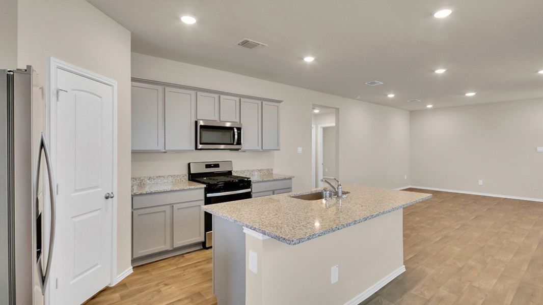 Furnished interior view inside a new home in Southgrove, Kyle (Image 6).