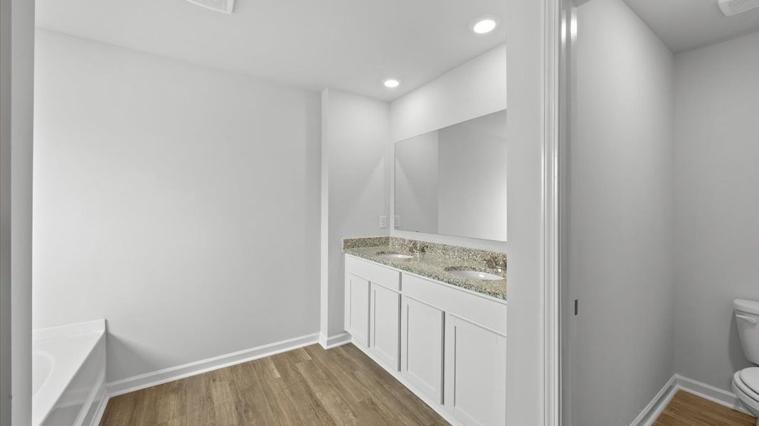 Furnished interior view inside a new home in Highland Hills, Graniteville (Image 7).