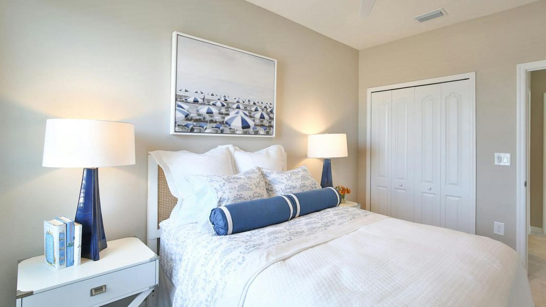 Furnished interior view inside a new home in Palm Grove Real Estate and Homes for Sale in Lakewood Ranch, FL - Neal Communities, Lakewood Ranch (Image 30).