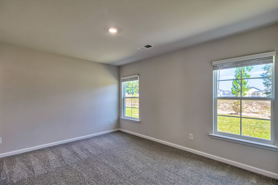 Representative unfurnished interior of a home built from the Juniper by McGuinn Homes in Hunters Branch, Hopkins (Image 12).