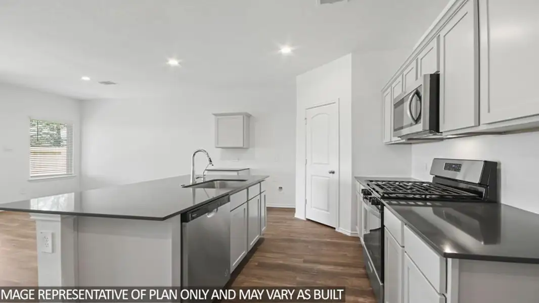 Furnished interior view inside a new home in Harrington Trails at The Canopies, Splendora (Image 4).