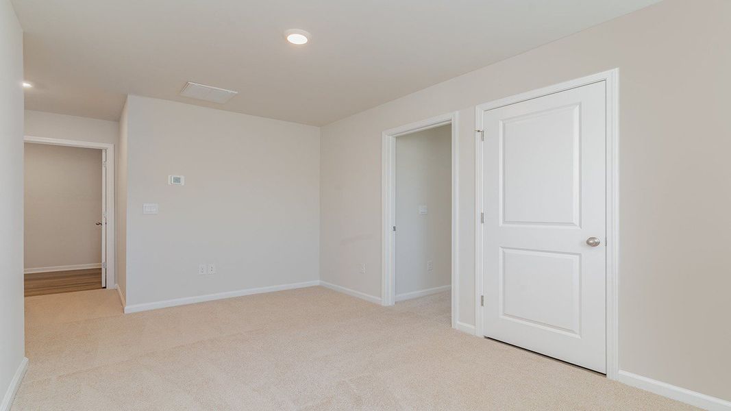 Representative unfurnished interior of a home built from the ROBIE by D.R. Horton in Sandridge Park, Little River (Image 14).