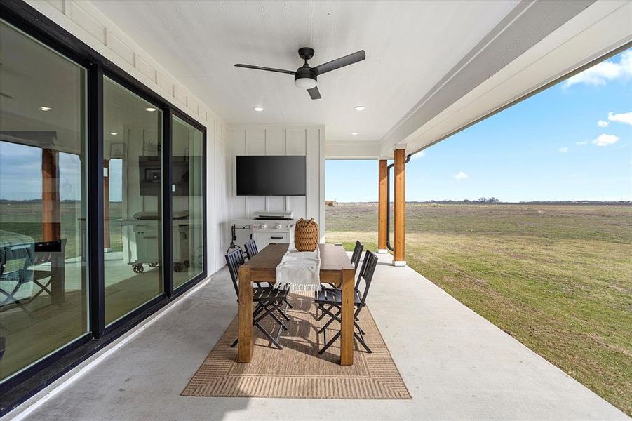 View of patio with ceiling fan