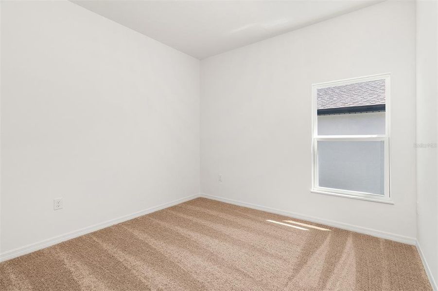 Spacious, unfurnished interior of a new home in Peach Crossings, Winter Haven (Image 19).