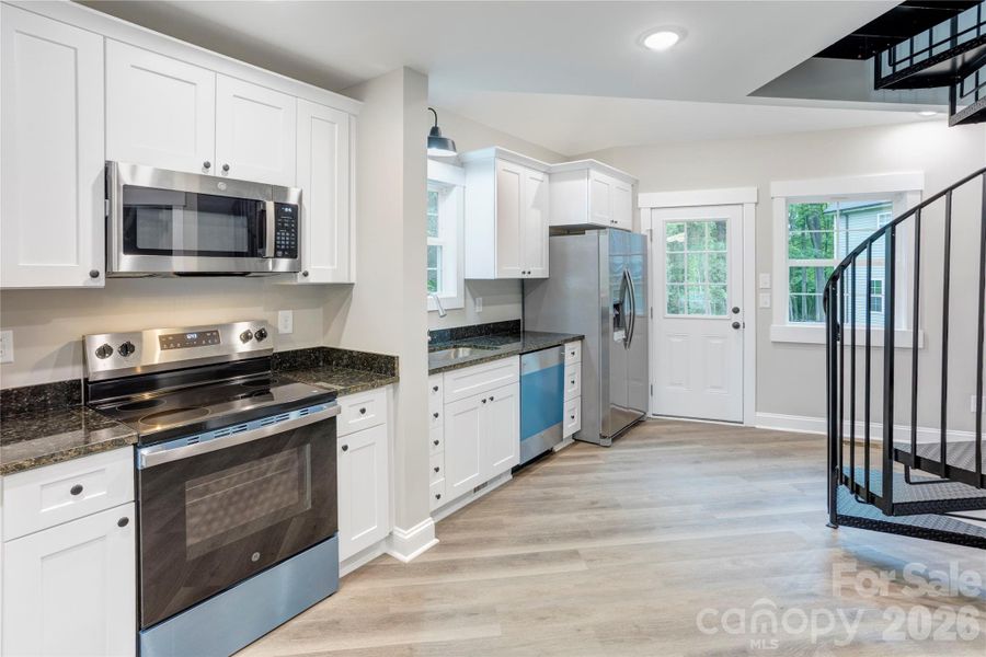 Furnished interior view inside a new home in , Concord (Image 5).