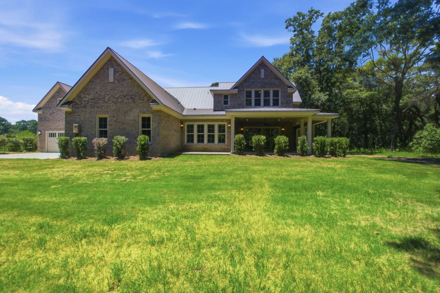 Exterior details and patio area of a home in , Johns Island (Image 32).