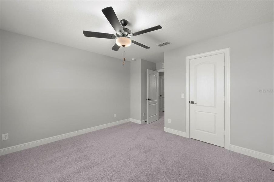 Spacious, unfurnished interior of a new home in Gum Lake Preserve, Lake Alfred (Image 11).