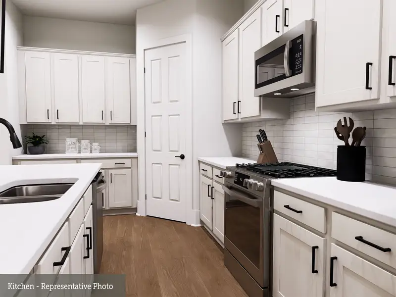 Furnished interior view inside a new home in The Woodlands Hills - Reserve Collection, Willis (Image 6).