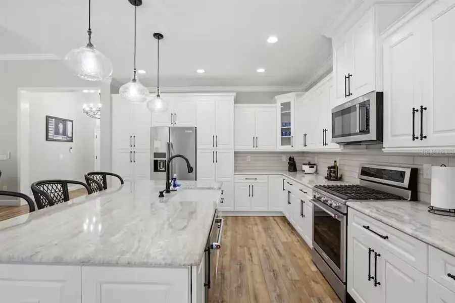 Furnished interior view inside a new home in , Dunnellon (Image 4).